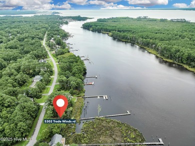 Waterfront homesite with extensive dock frontage in the gated on Harbour Point Golf Club in North Carolina - for sale on GolfHomes.com, golf home, golf lot