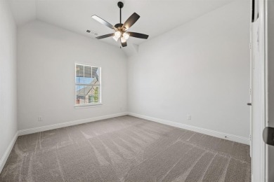 ACT NOW! Welcome to this immaculate corner-lot home in Argyle's on Lantana Golf Club in Texas - for sale on GolfHomes.com, golf home, golf lot