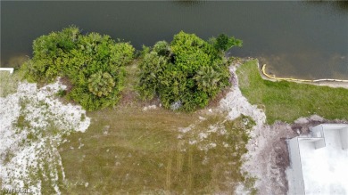 Welcome to your waterfront paradise! This stunning freshwater on Del Tura Golf and Country Club in Florida - for sale on GolfHomes.com, golf home, golf lot