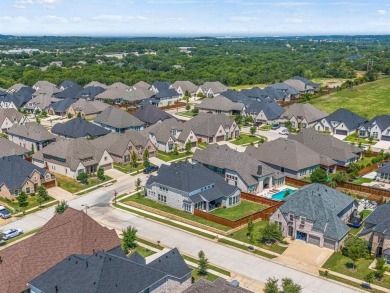 ACT NOW! Welcome to this immaculate corner-lot home in Argyle's on Lantana Golf Club in Texas - for sale on GolfHomes.com, golf home, golf lot