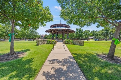 ACT NOW! Welcome to this immaculate corner-lot home in Argyle's on Lantana Golf Club in Texas - for sale on GolfHomes.com, golf home, golf lot