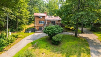 Discover the perfect blend of comfort, privacy, and convenience on Martindale Country Club in Maine - for sale on GolfHomes.com, golf home, golf lot