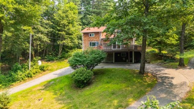 Discover the perfect blend of comfort, privacy, and convenience on Martindale Country Club in Maine - for sale on GolfHomes.com, golf home, golf lot