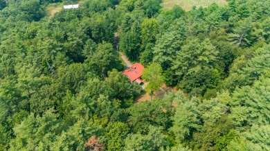 Discover the perfect blend of comfort, privacy, and convenience on Martindale Country Club in Maine - for sale on GolfHomes.com, golf home, golf lot