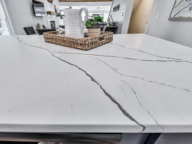 Wake up to breathtaking lake views, glowing sunsets, and on The Highlands Course at Lake Arrowhead in Georgia - for sale on GolfHomes.com, golf home, golf lot