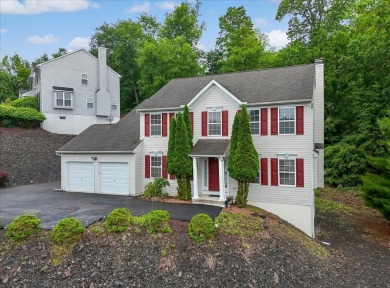 Discover this beautifully maintained 4-bedroom, 3-bath Colonial on Country Club of the Poconos Golf Course in Pennsylvania - for sale on GolfHomes.com, golf home, golf lot