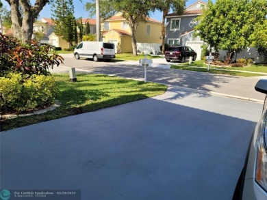 Nestled in the highly sought-after, gated golf course community on Atlantic National Golf and Country Club in Florida - for sale on GolfHomes.com, golf home, golf lot