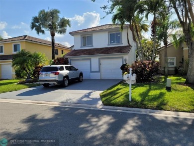 Nestled in the highly sought-after, gated golf course community on Atlantic National Golf and Country Club in Florida - for sale on GolfHomes.com, golf home, golf lot