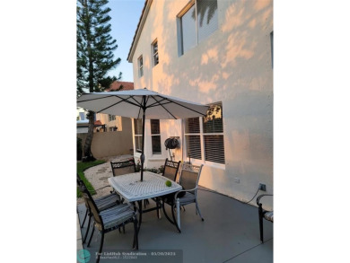 Nestled in the highly sought-after, gated golf course community on Atlantic National Golf and Country Club in Florida - for sale on GolfHomes.com, golf home, golf lot