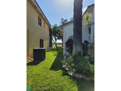 Nestled in the highly sought-after, gated golf course community on Atlantic National Golf and Country Club in Florida - for sale on GolfHomes.com, golf home, golf lot