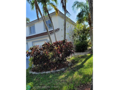 Nestled in the highly sought-after, gated golf course community on Atlantic National Golf and Country Club in Florida - for sale on GolfHomes.com, golf home, golf lot