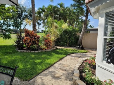 Nestled in the highly sought-after, gated golf course community on Atlantic National Golf and Country Club in Florida - for sale on GolfHomes.com, golf home, golf lot