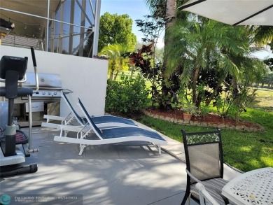 Nestled in the highly sought-after, gated golf course community on Atlantic National Golf and Country Club in Florida - for sale on GolfHomes.com, golf home, golf lot