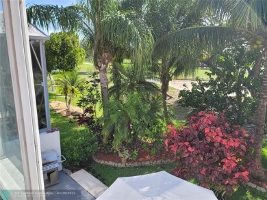 Nestled in the highly sought-after, gated golf course community on Atlantic National Golf and Country Club in Florida - for sale on GolfHomes.com, golf home, golf lot