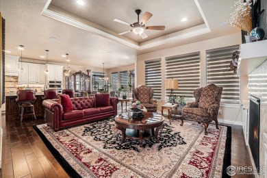 This stunning custom home is nestled at the end of a serene on Highland Meadows Golf Course in Colorado - for sale on GolfHomes.com, golf home, golf lot