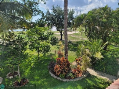 Nestled in the highly sought-after, gated golf course community on Atlantic National Golf and Country Club in Florida - for sale on GolfHomes.com, golf home, golf lot