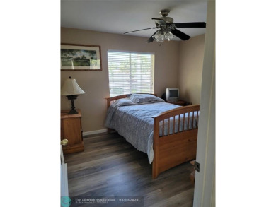 Nestled in the highly sought-after, gated golf course community on Atlantic National Golf and Country Club in Florida - for sale on GolfHomes.com, golf home, golf lot