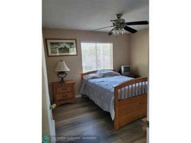 Nestled in the highly sought-after, gated golf course community on Atlantic National Golf and Country Club in Florida - for sale on GolfHomes.com, golf home, golf lot