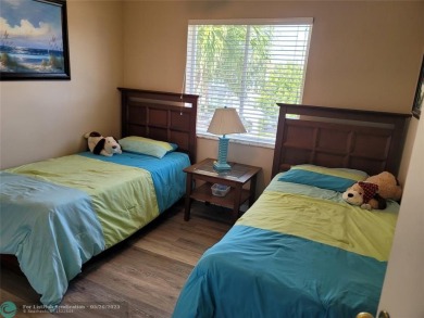 Nestled in the highly sought-after, gated golf course community on Atlantic National Golf and Country Club in Florida - for sale on GolfHomes.com, golf home, golf lot