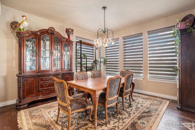 This stunning custom home is nestled at the end of a serene on Highland Meadows Golf Course in Colorado - for sale on GolfHomes.com, golf home, golf lot