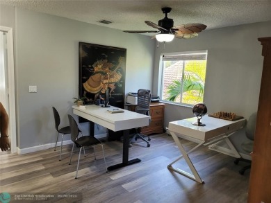 Nestled in the highly sought-after, gated golf course community on Atlantic National Golf and Country Club in Florida - for sale on GolfHomes.com, golf home, golf lot