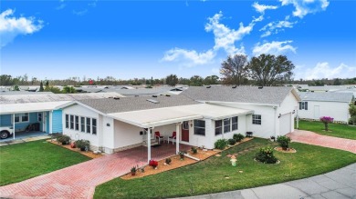 Welcome to this stunning home in a sought-after 55+ resort-style on Sweetwater Golf and Tennis Club in Florida - for sale on GolfHomes.com, golf home, golf lot