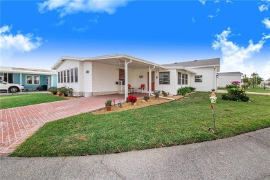 Welcome to this stunning home in a sought-after 55+ resort-style on Sweetwater Golf and Tennis Club in Florida - for sale on GolfHomes.com, golf home, golf lot