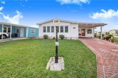 Welcome to this stunning home in a sought-after 55+ resort-style on Sweetwater Golf and Tennis Club in Florida - for sale on GolfHomes.com, golf home, golf lot