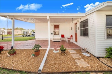 Welcome to this stunning home in a sought-after 55+ resort-style on Sweetwater Golf and Tennis Club in Florida - for sale on GolfHomes.com, golf home, golf lot