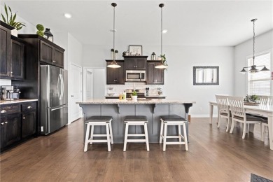 Welcome to this beautifully designed 1.5-story home offering 4 on Golf Club of Creekmoor in Missouri - for sale on GolfHomes.com, golf home, golf lot