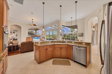 Welcome to effortless luxury living in the highly sought-after on University Park Country Club in Florida - for sale on GolfHomes.com, golf home, golf lot