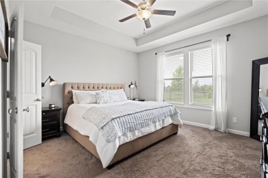 Welcome to this beautifully designed 1.5-story home offering 4 on Golf Club of Creekmoor in Missouri - for sale on GolfHomes.com, golf home, golf lot