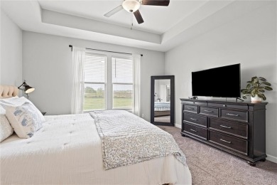 Welcome to this beautifully designed 1.5-story home offering 4 on Golf Club of Creekmoor in Missouri - for sale on GolfHomes.com, golf home, golf lot