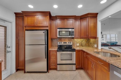 NEW  PRICE REDUCTION!!!!  3 BEDROOM CORNER UNIT!! WATER VIEW on Palm-Aire Country Club and Resort - Palms in Florida - for sale on GolfHomes.com, golf home, golf lot