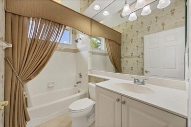 Welcome to effortless luxury living in the highly sought-after on University Park Country Club in Florida - for sale on GolfHomes.com, golf home, golf lot