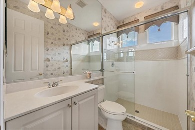 Welcome to effortless luxury living in the highly sought-after on University Park Country Club in Florida - for sale on GolfHomes.com, golf home, golf lot