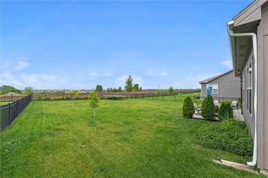 Welcome to this beautifully designed 1.5-story home offering 4 on Golf Club of Creekmoor in Missouri - for sale on GolfHomes.com, golf home, golf lot