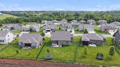 Welcome to this beautifully designed 1.5-story home offering 4 on Golf Club of Creekmoor in Missouri - for sale on GolfHomes.com, golf home, golf lot