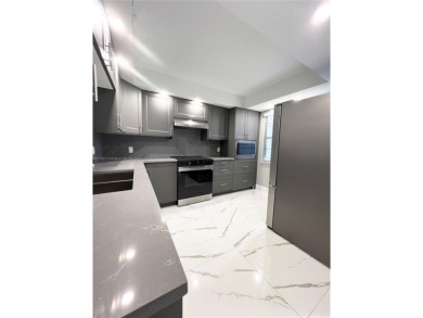 PERFECTION DOES EXIST! COME SEE THIS STUNNING HOME IN THE HEART on Wynmoor Golf Course in Florida - for sale on GolfHomes.com, golf home, golf lot