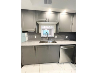 PERFECTION DOES EXIST! COME SEE THIS STUNNING HOME IN THE HEART on Wynmoor Golf Course in Florida - for sale on GolfHomes.com, golf home, golf lot
