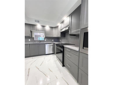 PERFECTION DOES EXIST! COME SEE THIS STUNNING HOME IN THE HEART on Wynmoor Golf Course in Florida - for sale on GolfHomes.com, golf home, golf lot