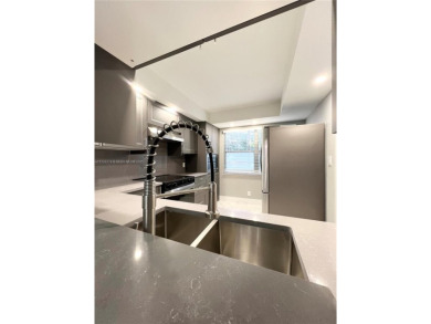 PERFECTION DOES EXIST! COME SEE THIS STUNNING HOME IN THE HEART on Wynmoor Golf Course in Florida - for sale on GolfHomes.com, golf home, golf lot