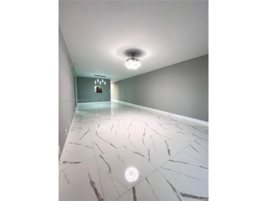 PERFECTION DOES EXIST! COME SEE THIS STUNNING HOME IN THE HEART on Wynmoor Golf Course in Florida - for sale on GolfHomes.com, golf home, golf lot