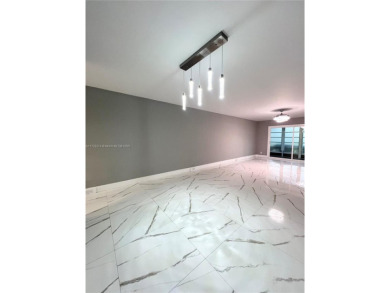 PERFECTION DOES EXIST! COME SEE THIS STUNNING HOME IN THE HEART on Wynmoor Golf Course in Florida - for sale on GolfHomes.com, golf home, golf lot