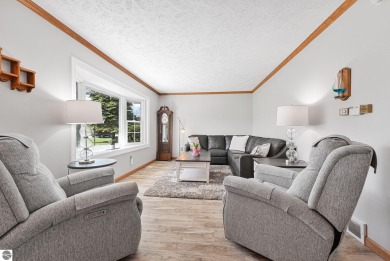 Pride of ownership shines throughout this beautiful home in on Lochen Heath Golf Course in Michigan - for sale on GolfHomes.com, golf home, golf lot