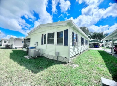 This stunning, partically furnished residence offers an inviting on Fairway Village Golf Course in Florida - for sale on GolfHomes.com, golf home, golf lot