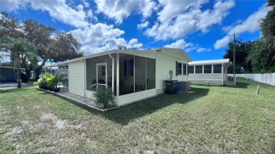 This stunning, partically furnished residence offers an inviting on Fairway Village Golf Course in Florida - for sale on GolfHomes.com, golf home, golf lot