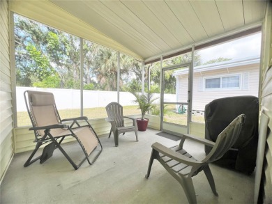 This stunning, partically furnished residence offers an inviting on Fairway Village Golf Course in Florida - for sale on GolfHomes.com, golf home, golf lot