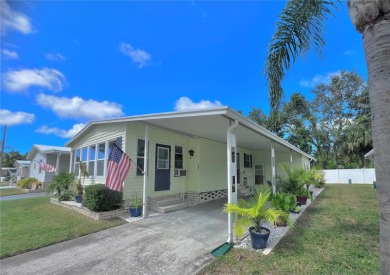 This stunning, partically furnished residence offers an inviting on Fairway Village Golf Course in Florida - for sale on GolfHomes.com, golf home, golf lot