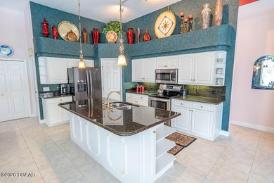 Pride of ownership shines throughout this immaculate well on Plantation Bay Golf and Country Club in Florida - for sale on GolfHomes.com, golf home, golf lot